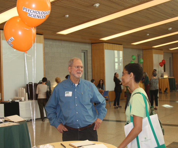 Professor Langholtz greets Danielle Thomas (Class of 2014) at the registration desk